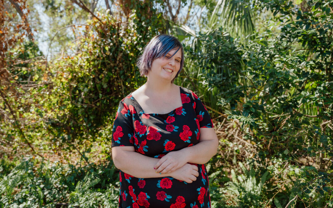 Photo of Madilynne smiling outside at Quest's Training Center in Tampa.